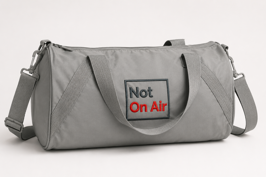 Gray Not On Air barrel duffel bag with a dark gray and red embroidered logo on the front panel.